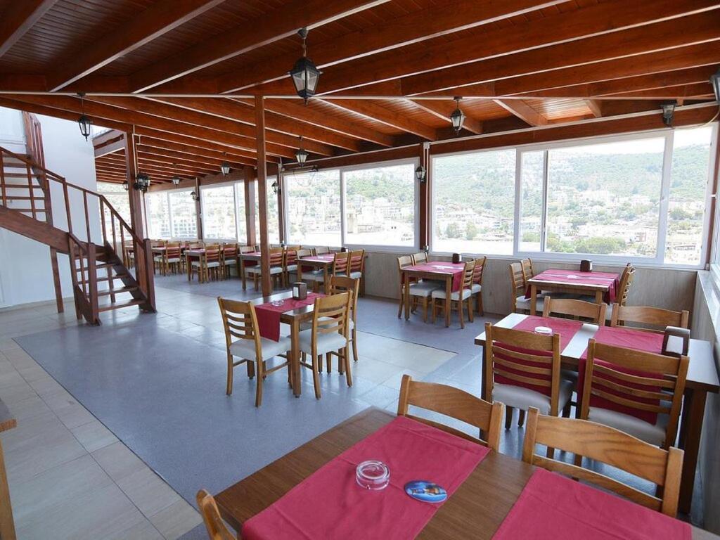 Airport Guelluek Otel Миляс Экстерьер фото